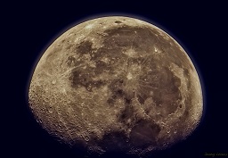 A highly detailed dawn view of the moon.